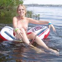 Cutie hanging out on the lake doing a little naked tubing catch her having a good time with her fingers