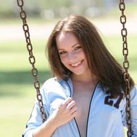 Hottie tabitha is swinging at the park just having a good ol time teasing taking down her jacket