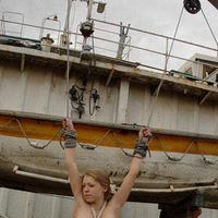 Hot Russian blonde tied and spread up naked on a ship