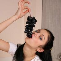 Smoking hot teen undressing and eating grape