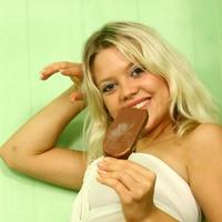 Teen Amber fooling aroung with ice-cream in bath