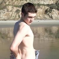 Twink Boy in a towel posing on the hot beach