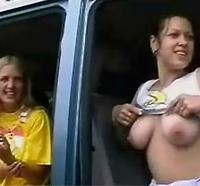 Naughty teens show tits in public