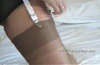 Putting on my tanned coloured stockings