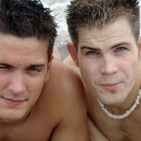 Xavier and JJ playing on the beach