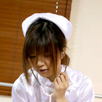 Rika in nurse uniform giving handjob