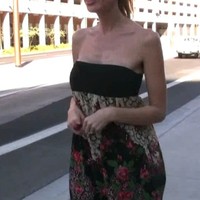 Busty blonde, Kylie Worthy, decides she just has to take a pee right in the parking lot and hikes up her skirt right there!