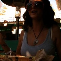 Beautiful busty brunette, Ava Addams, gets into the fun of public flashing while sitting at the restaurant talking about her hot