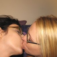 Two hot MILFs in glasses getting fucked in threesome