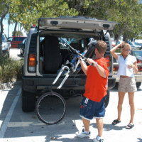 Skinny young mom gets help with her bike then helps smoke some pole