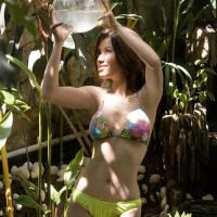 Charming asian Chiaki showing her huge breasts in the garden