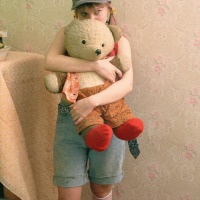 Teen blonde masturbates with her old bear toy