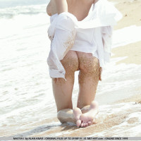 Nastya goes seaside as she rolls in the waves and sand getting wet and dirty.Watch where the sand ends up.