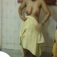 Sexy girl enjoying naked shower