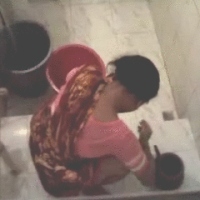 Mature aunty cought in her toilet