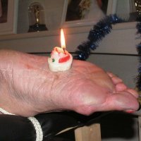 Woman gets hot candle wax on her bare foot
