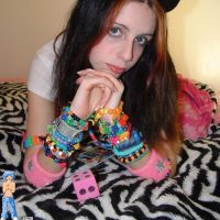 candy raver cutie gets naked and shows off