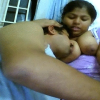 indian couple in lounge while hubby sucking his wife boobs