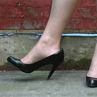 Sexy businesswoman Jackie starts by tempting you with her high heels out in the street. As your fetish begins to rise you can th