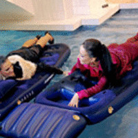 Two sexy lesbian chicks fucking on floatable beds