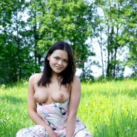 Hot chick loves masturbating outside in the grass