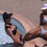 Horny lesbians doing tongue fuck in pool