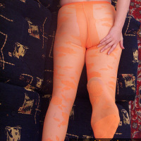 Orange pantyhose on MILF legs