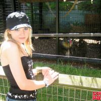 Appealing blonde teen babe Kitty Kim posing for you at the zoo