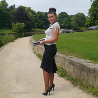 Lovely Karen is on her break and enjoying a bit of sunshine in her silky nylons and her black high heel shoes