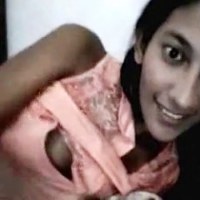 This is a video of an Indian girl, whose name is Avantika. She exposes her body in front of a webcam. She is doing her schooling and she is really hot at this young age. She looks cute and sexy and her perky boobs are waiting to come out of her dress....