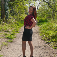 Hot redhead Milf Jenna sparkles in her silky nylon stockings and shiny black stiletto heels