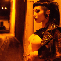 Punk rock Goth babe flashing in the city
