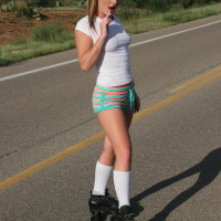 Kate's Playground: Kate's stunning girlfriend Abbie teases with her perky boobs and round ass outdoors as she roller skates on the road