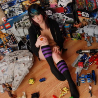 SpunkyAngels: Horny geek Sabrina plays with her favorite toy in her tight little ass surrounded by her other kinda toys