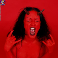 red demon slut fucks self with devil dildo