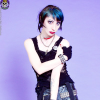 deathrock chick strips to boots and nothing else