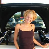 Naughty hot blonde getting naked at the carwash