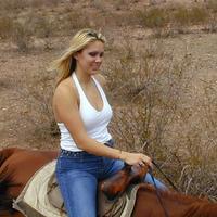 Busty blonde posing on back yard