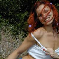 Russian red-haired nymphette showing pussy