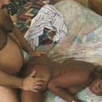 Porn star Ron Jeremy fucks a hot ebony babe in bed